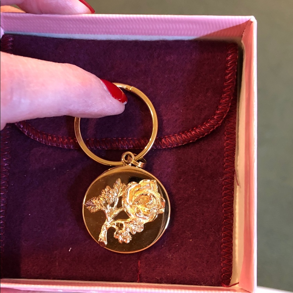 Avon Anniversary keychain/pendant